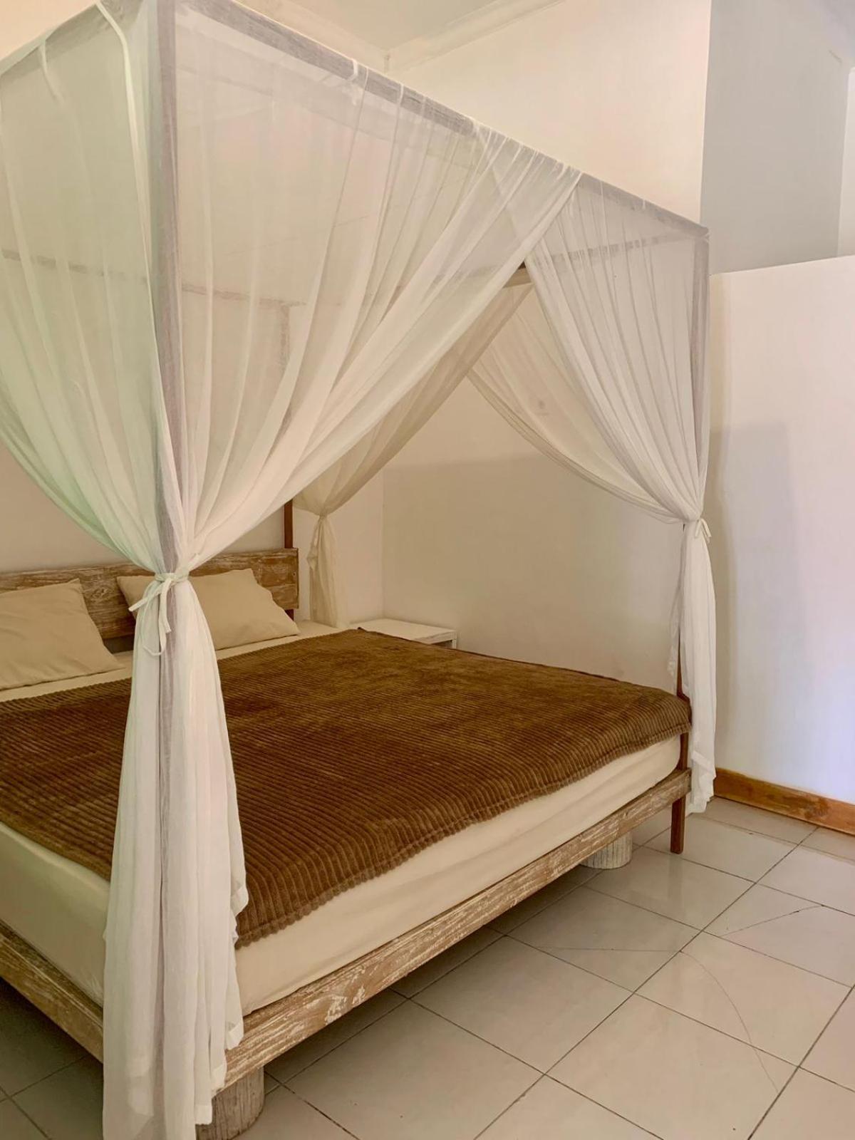 The Village Rua Beach Homestay Екстер'єр фото