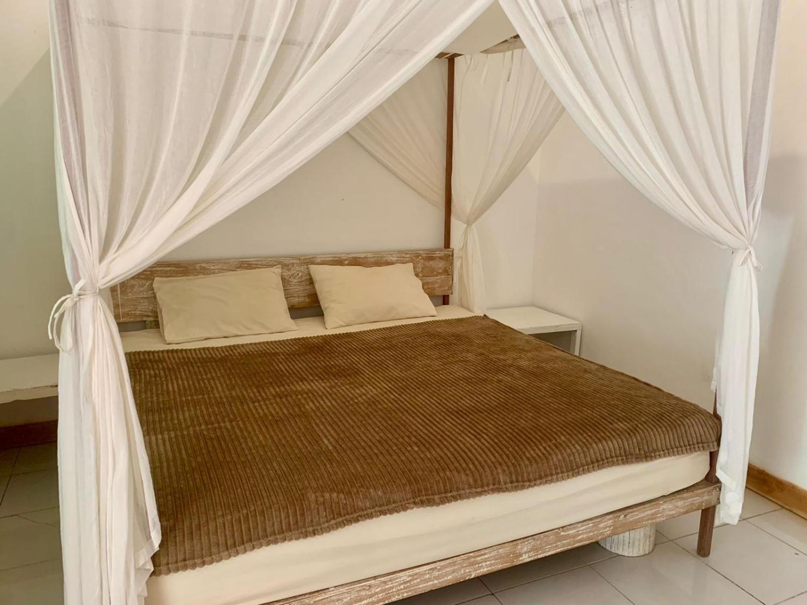 The Village Rua Beach Homestay Екстер'єр фото