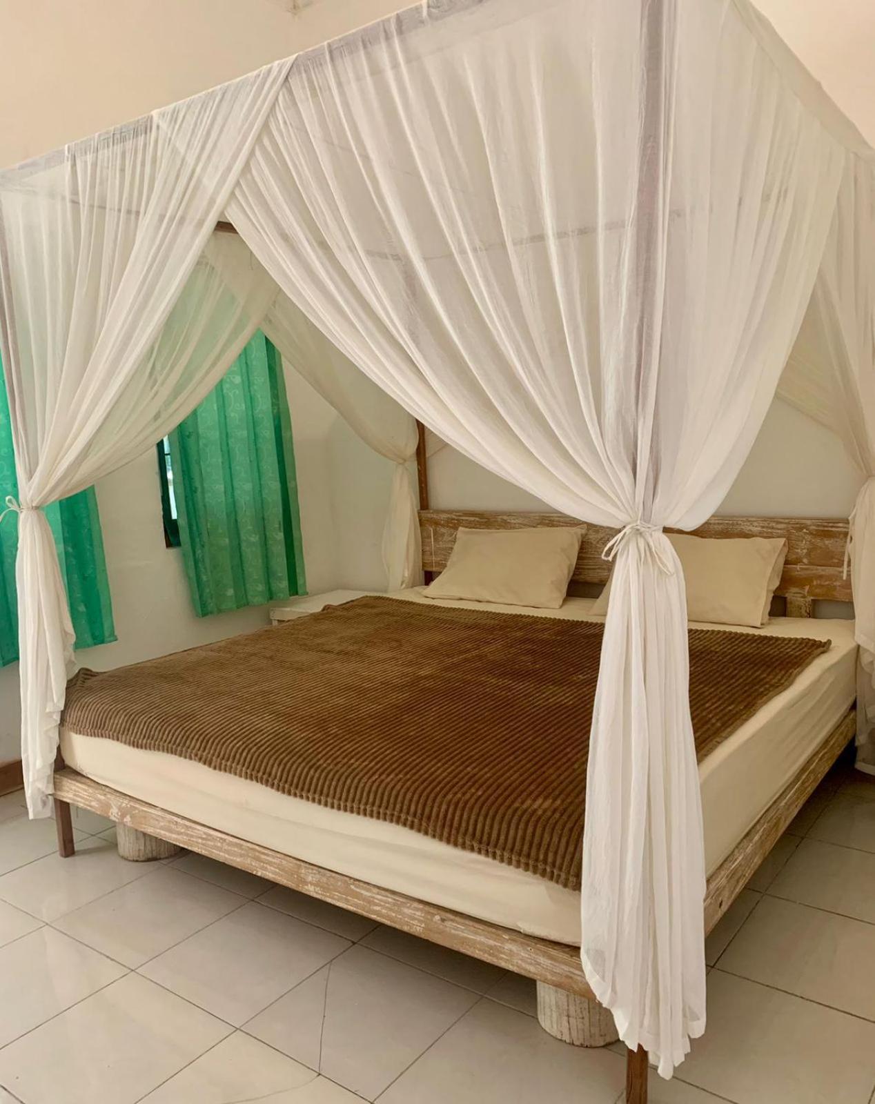 The Village Rua Beach Homestay Екстер'єр фото